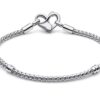 Pulsera corazón tachonado