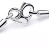 Pulsera corazón tachonado